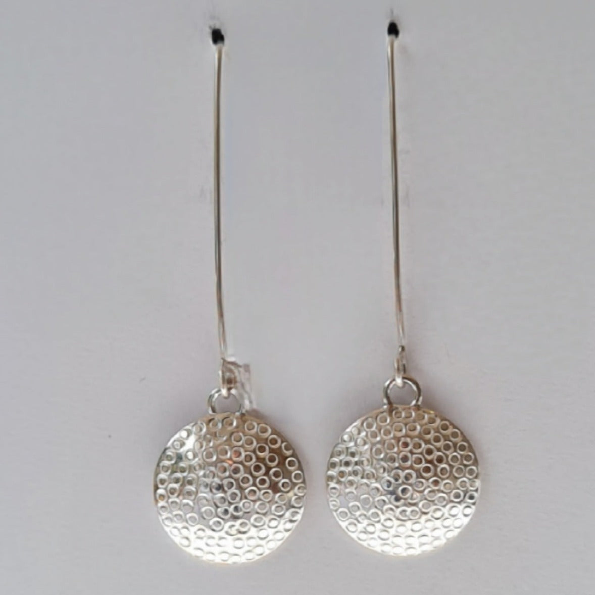Domed earrings with circle detail